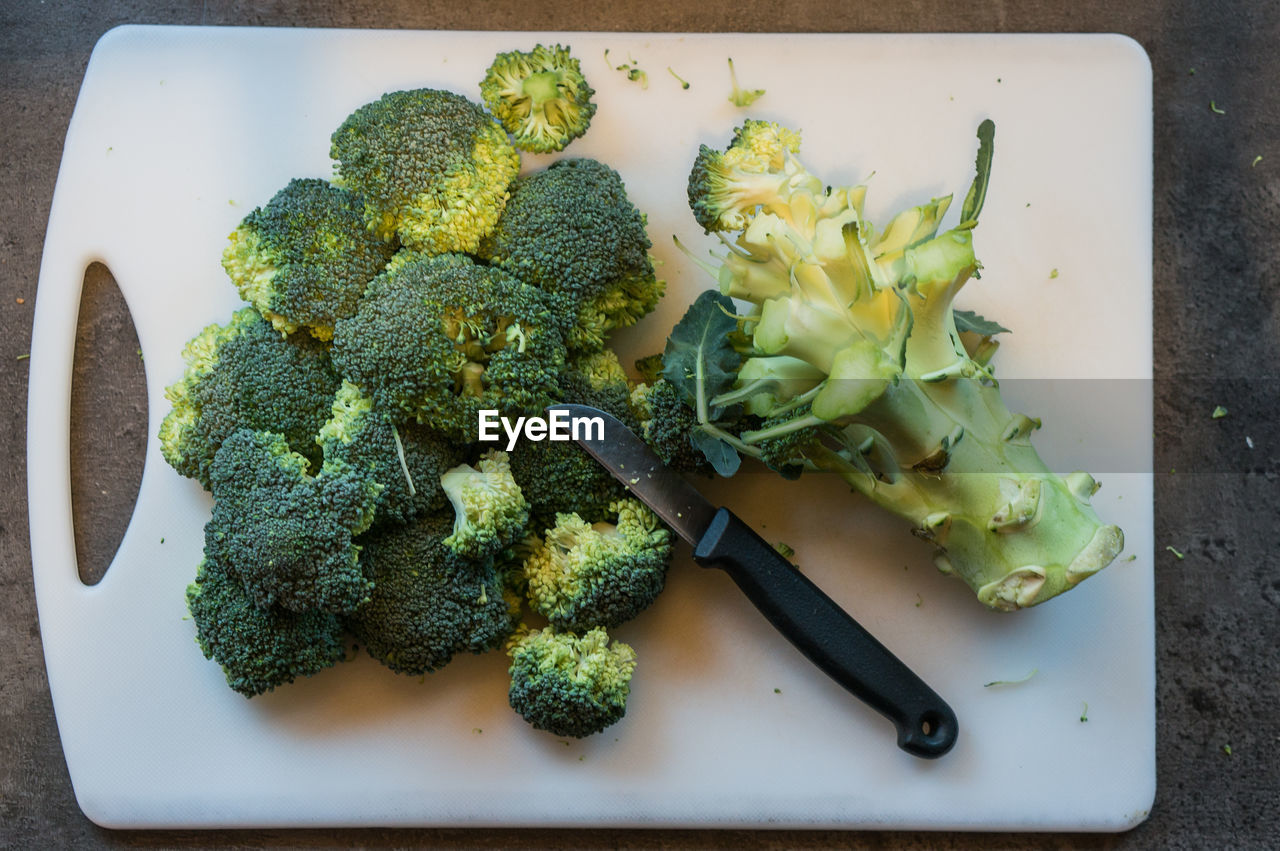 High angle view of broccoli on cutting board