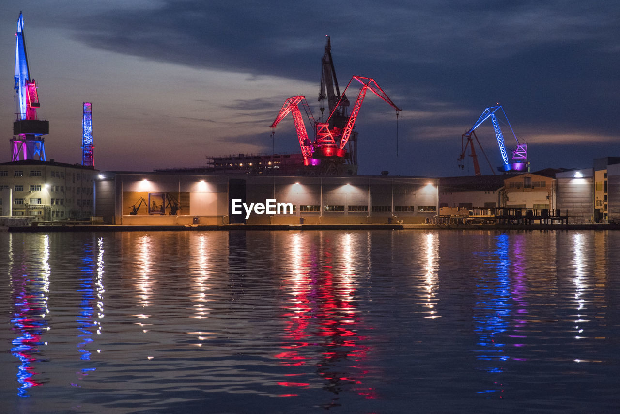 ILLUMINATED COMMERCIAL DOCK AT NIGHT