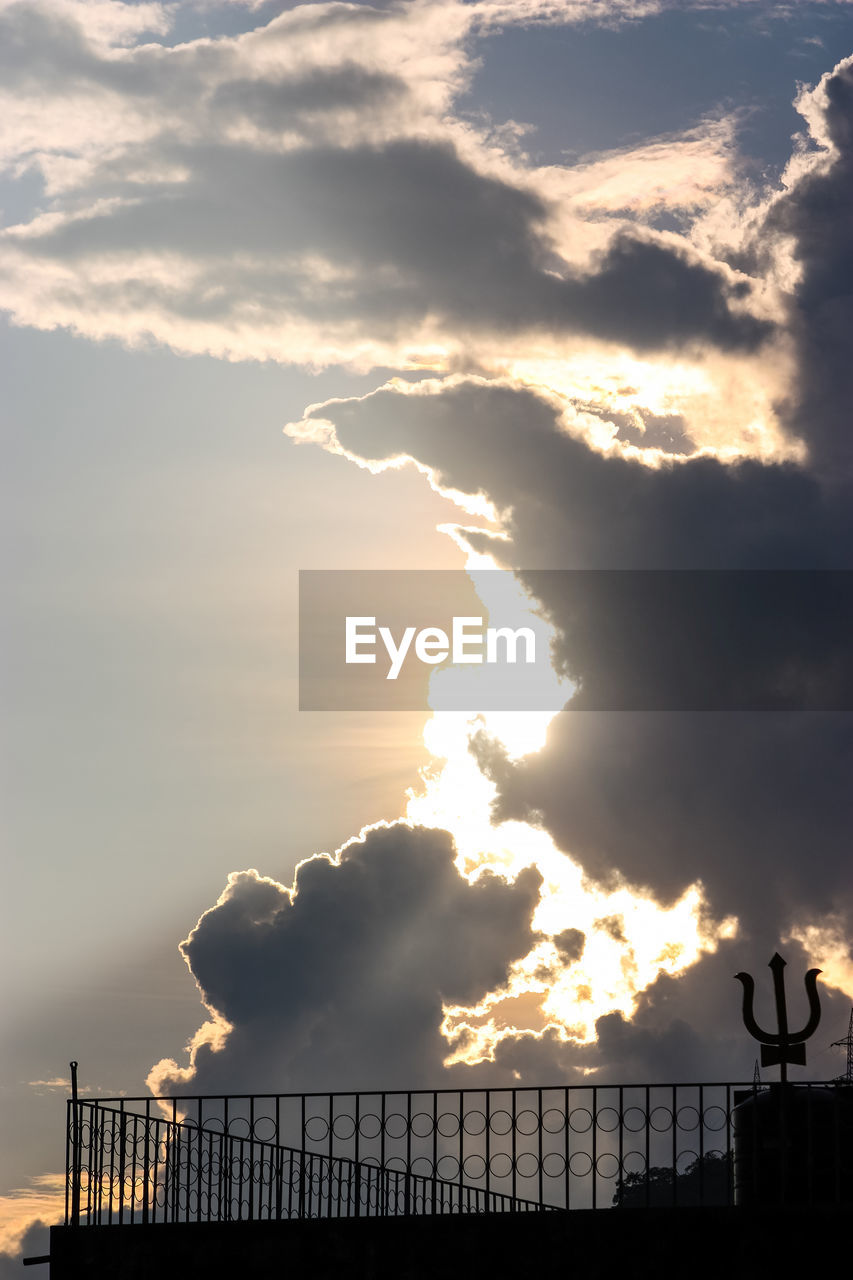 SILHOUETTE RAILING AGAINST SKY DURING SUNSET