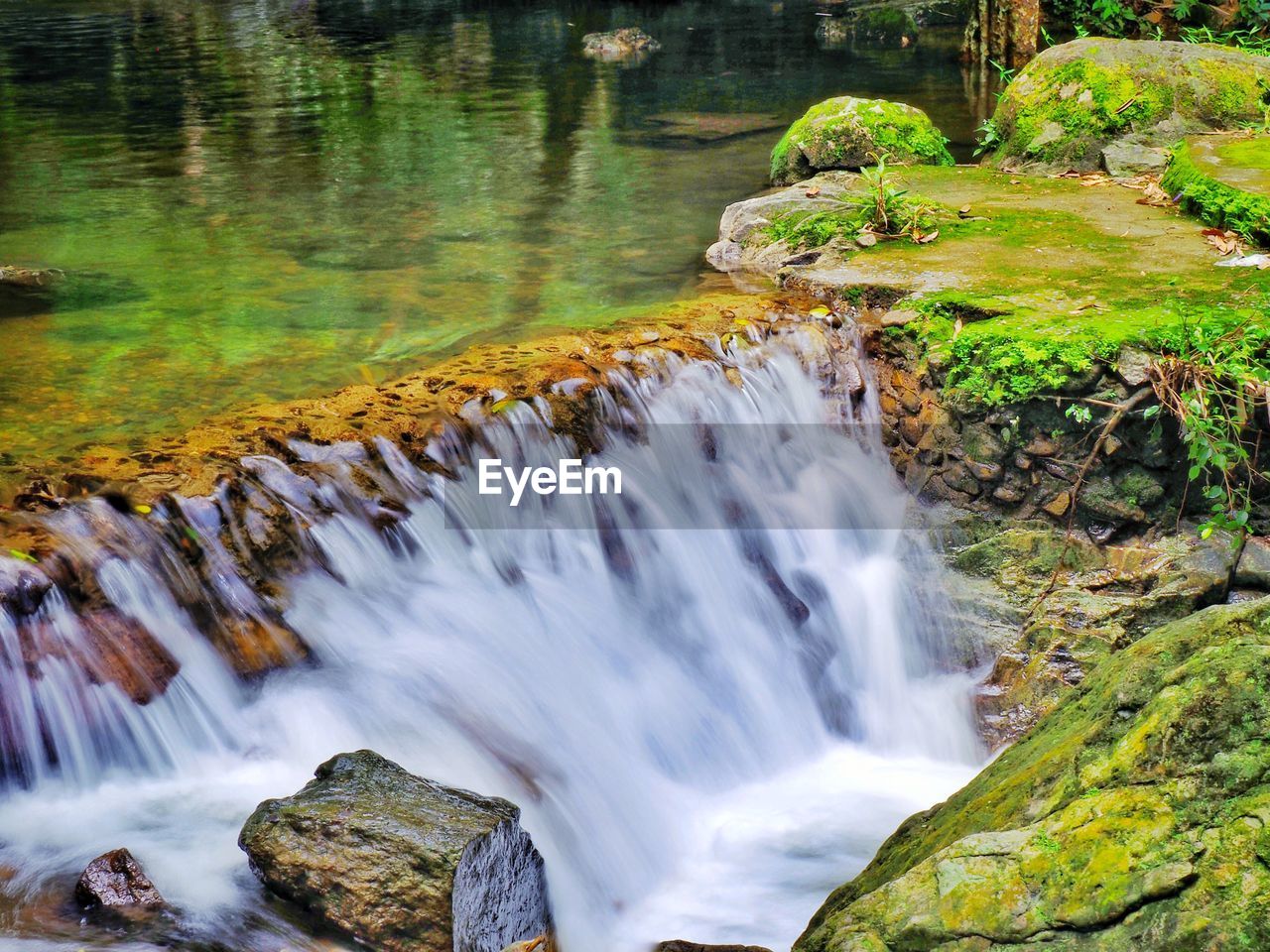 SCENIC VIEW OF WATERFALL