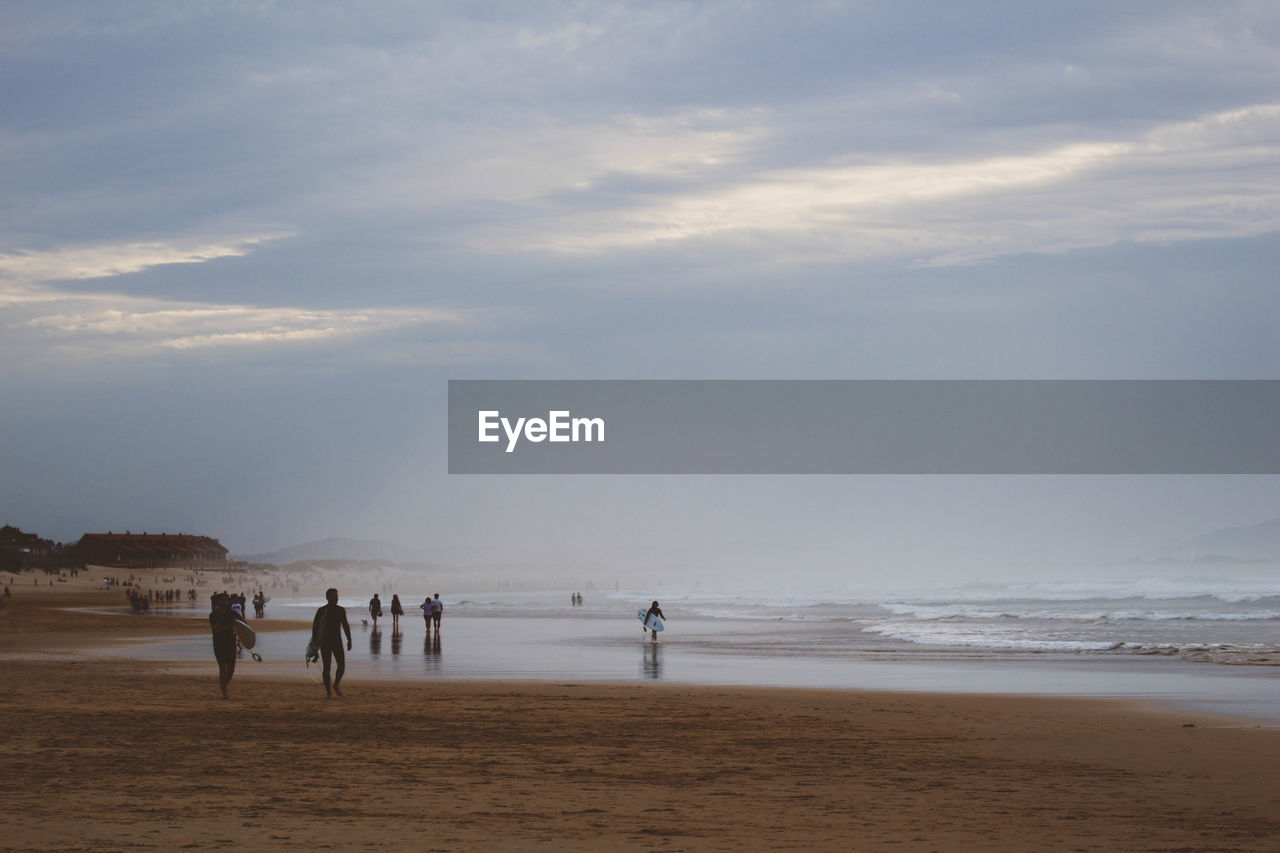 GROUP OF PEOPLE ON BEACH