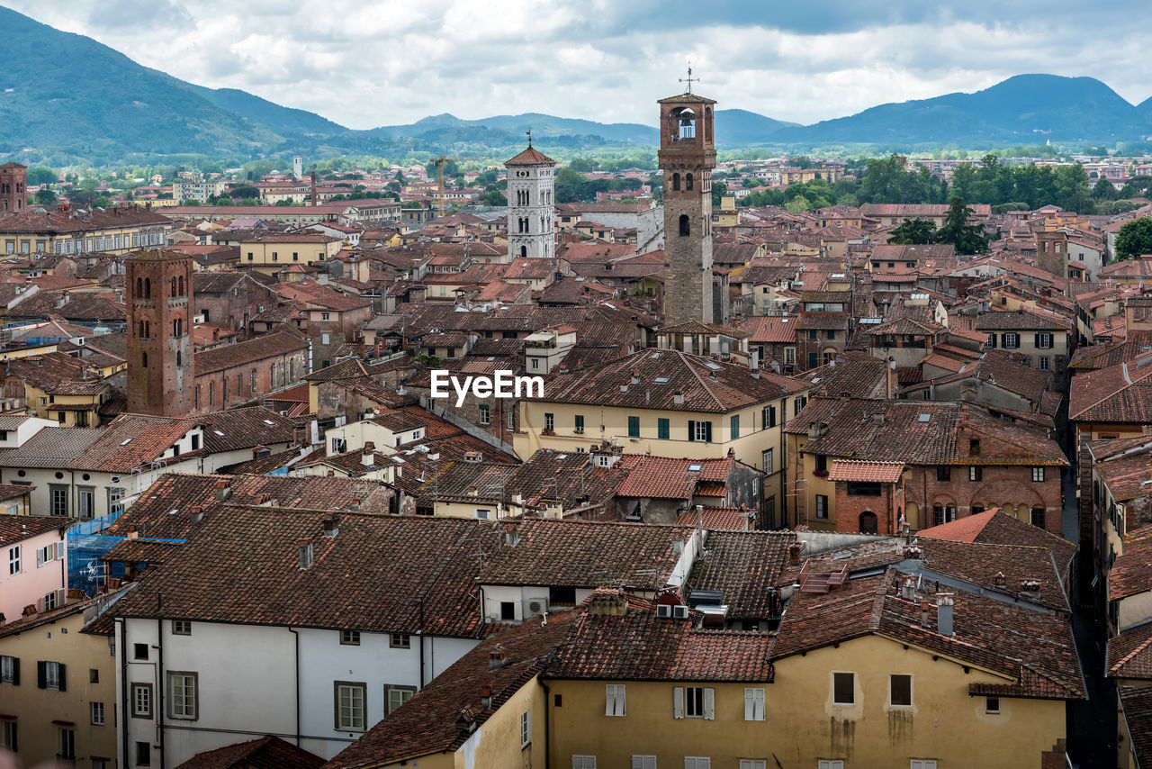 Town against sky in city