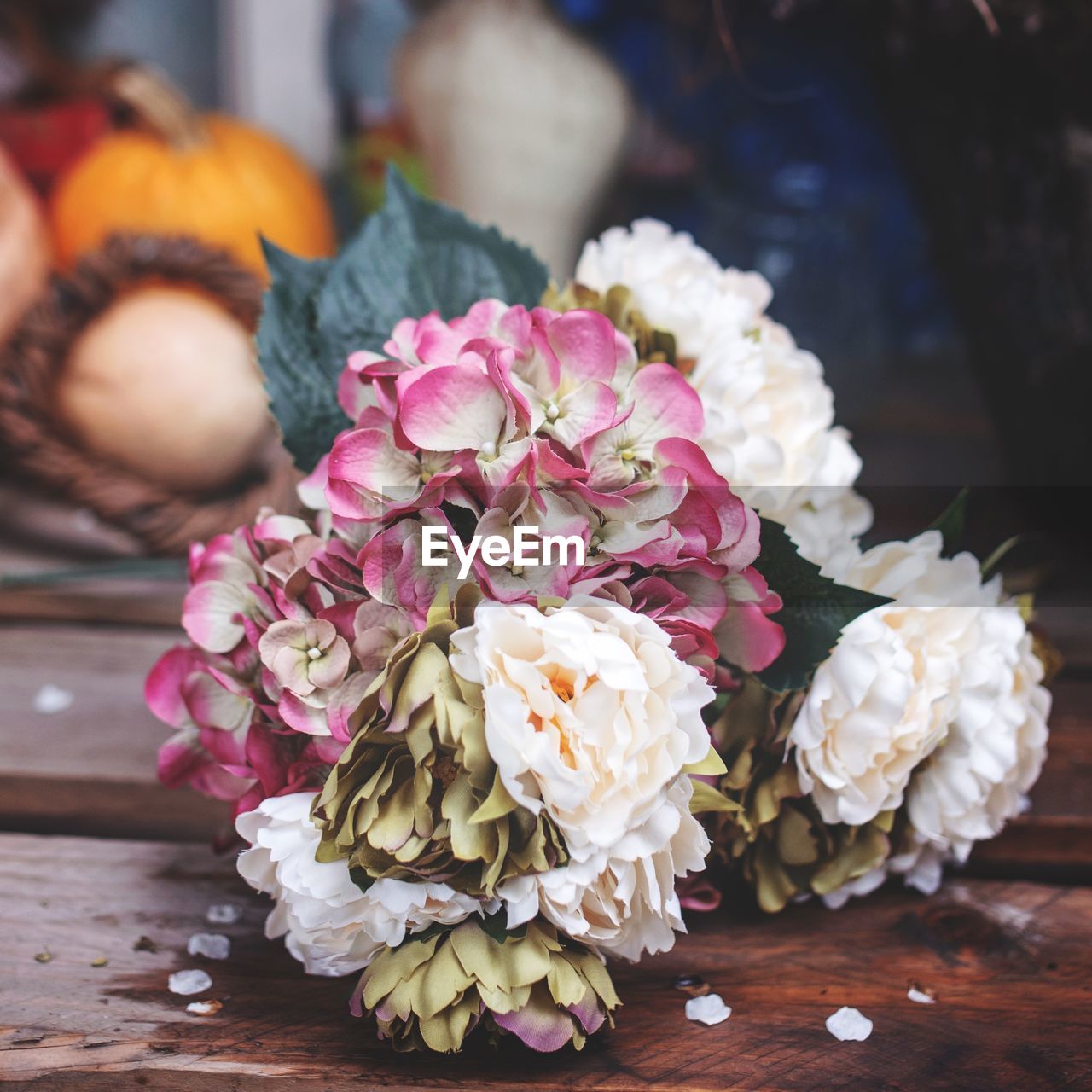 CLOSE-UP OF FLOWER BOUQUET ON TABLE