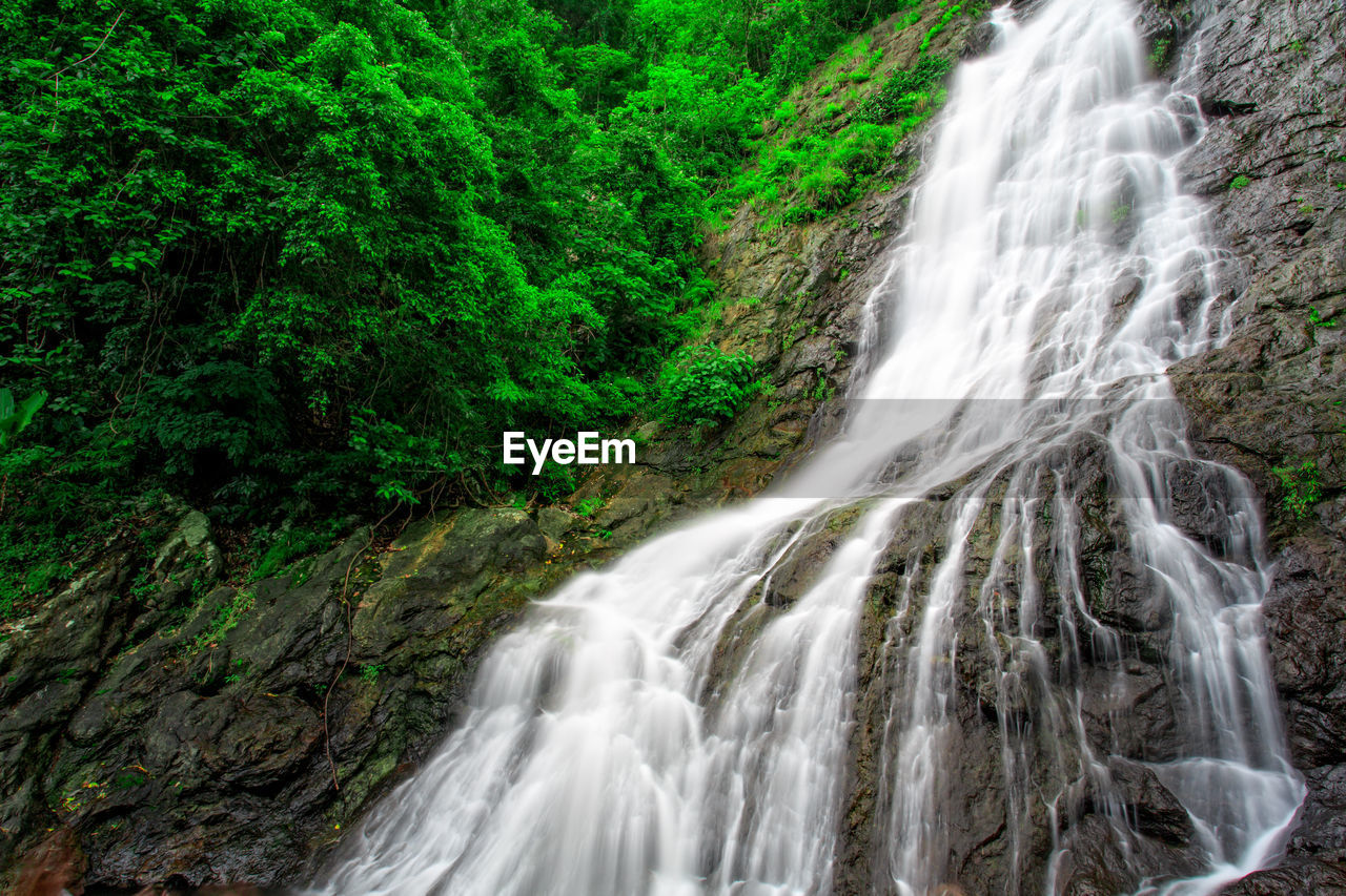 SCENIC VIEW OF WATERFALL