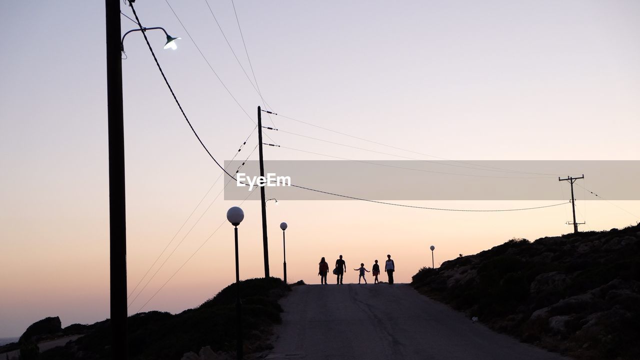 Group of people walking on road