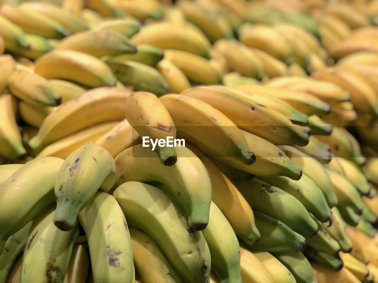 FULL FRAME SHOT OF BANANAS IN MARKET