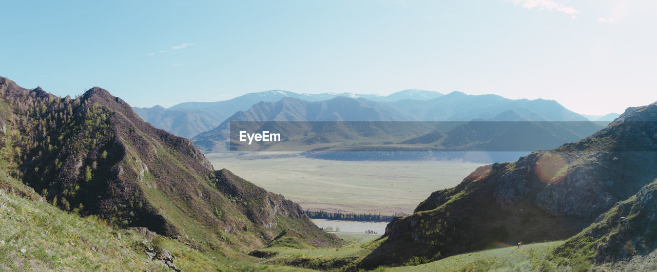 A panoramic view of a wilderness valley