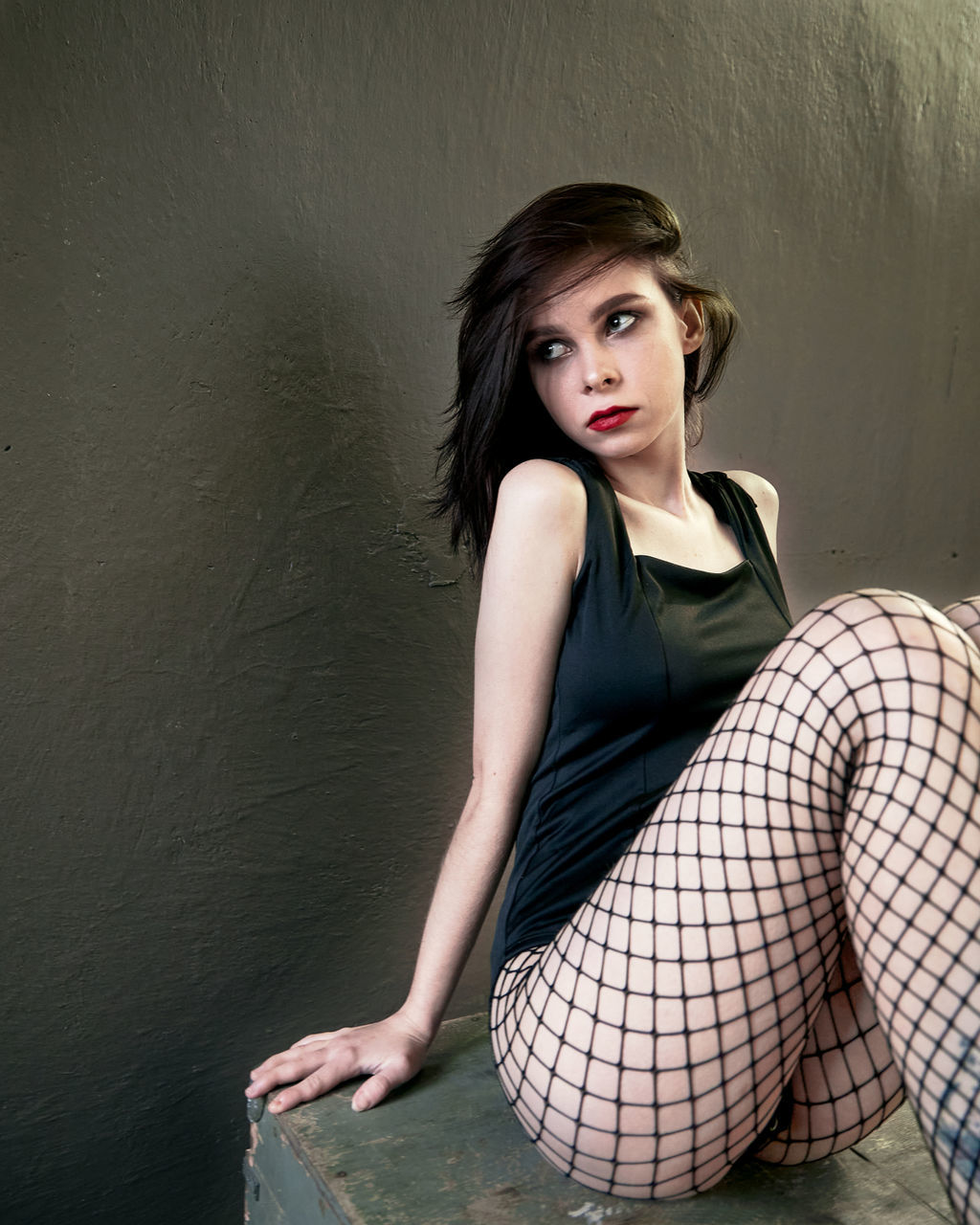 women, adult, fashion, one person, portrait, young adult, photo shoot, hairstyle, looking at camera, sitting, clothing, long hair, female, dress, portrait photography, brown hair, elegance, glamour, black, human leg, indoors, person, haute couture, contemplation, make-up, limb, desire, shoe, looking, full length