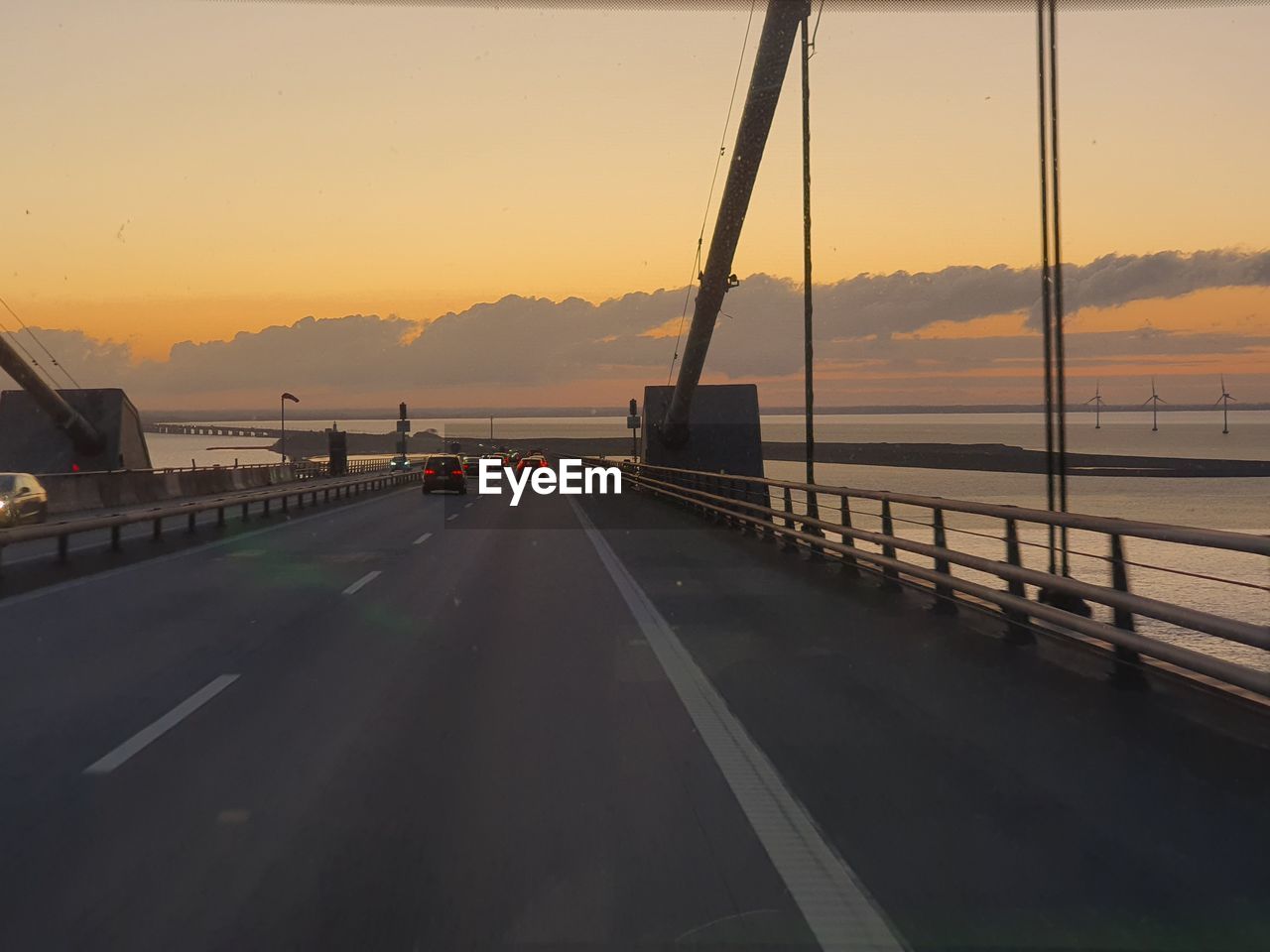 VIEW OF BRIDGE AGAINST SKY DURING SUNSET