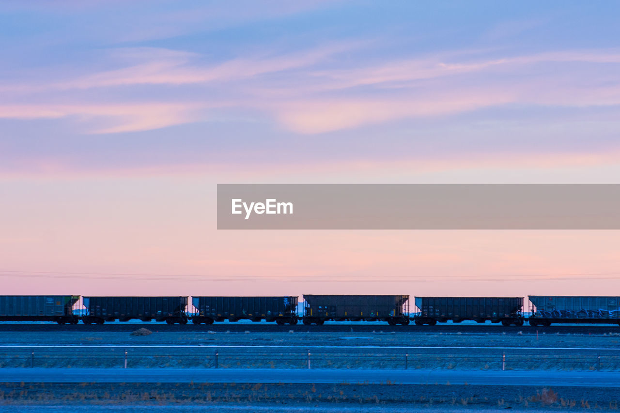 Train against sky during sunset