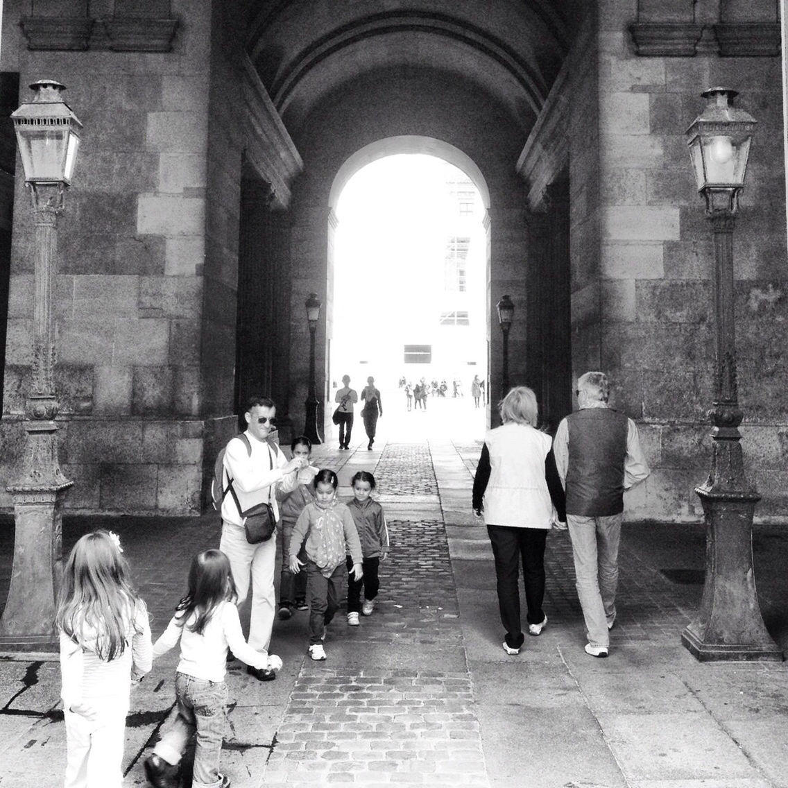 WOMAN WALKING IN CORRIDOR