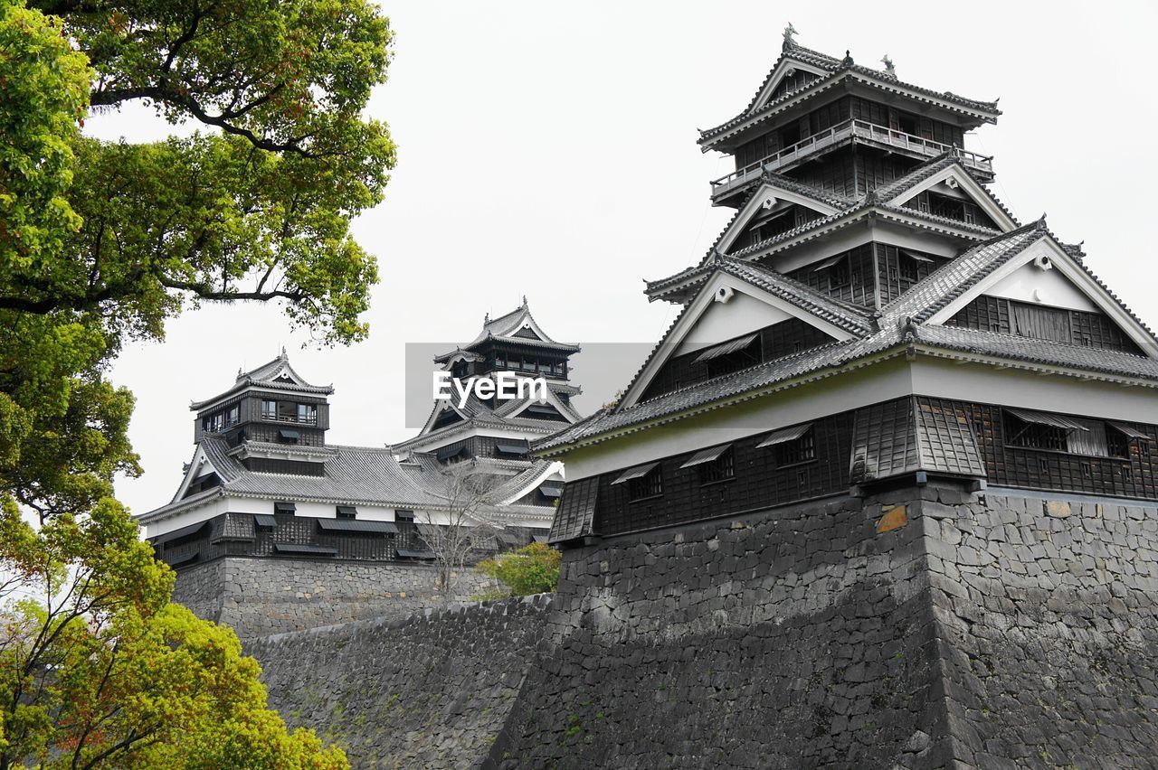 LOW ANGLE VIEW OF TEMPLE WITH TEMPLE