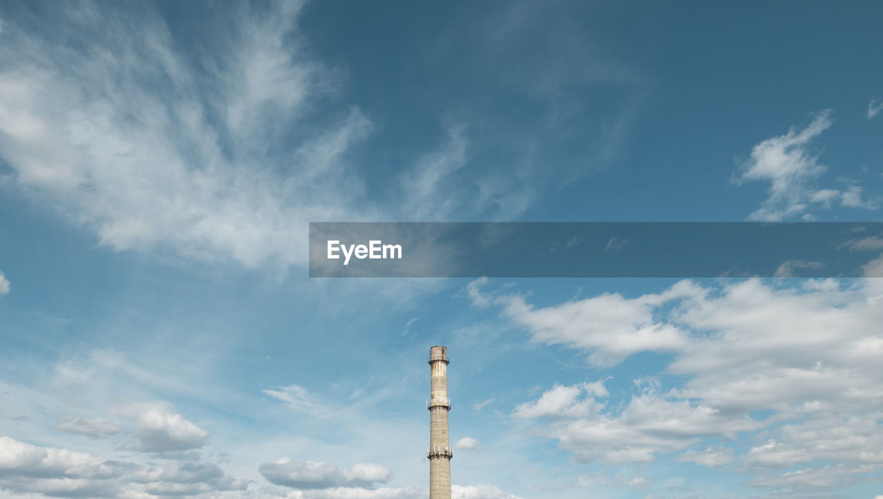 Smoke stack against sky