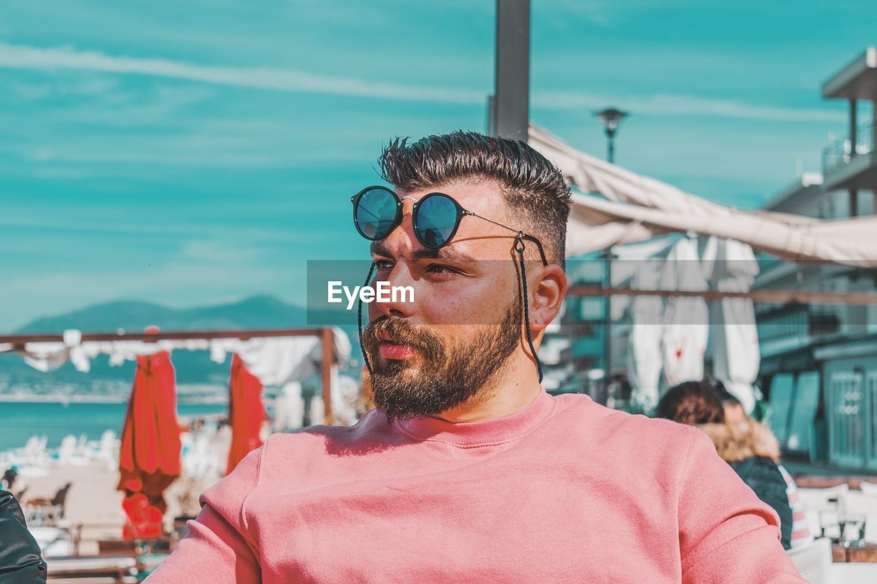 Portrait of young man wearing sunglasses