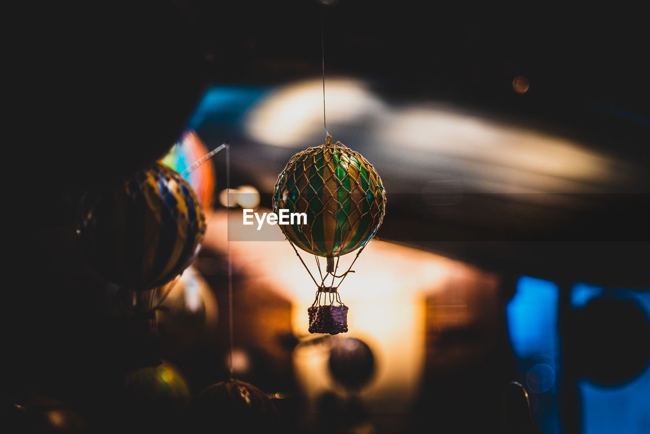 Beautiful bokeh of a small hot air balloon toy hanging.