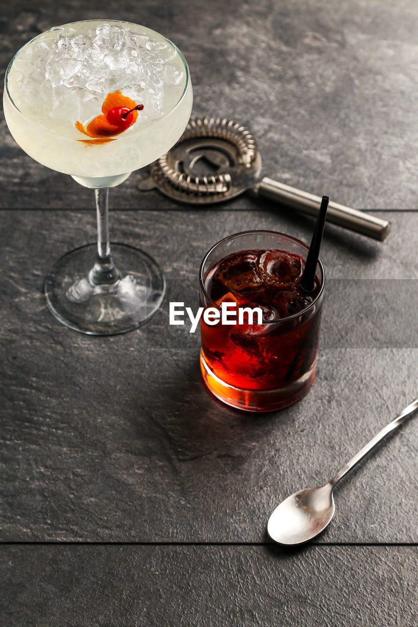 High angle view of drinks on slate