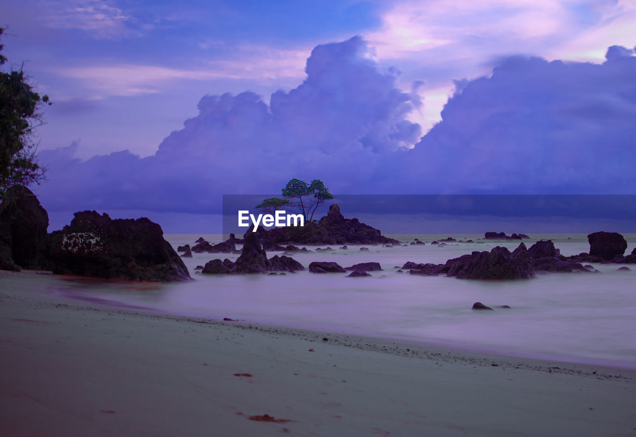 Scenic view of sea against sky at sunset