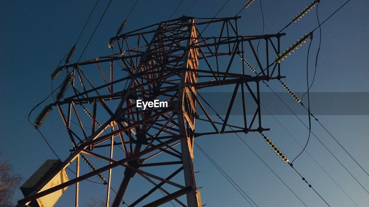 LOW ANGLE VIEW OF ELECTRICITY PYLON AGAINST SKY