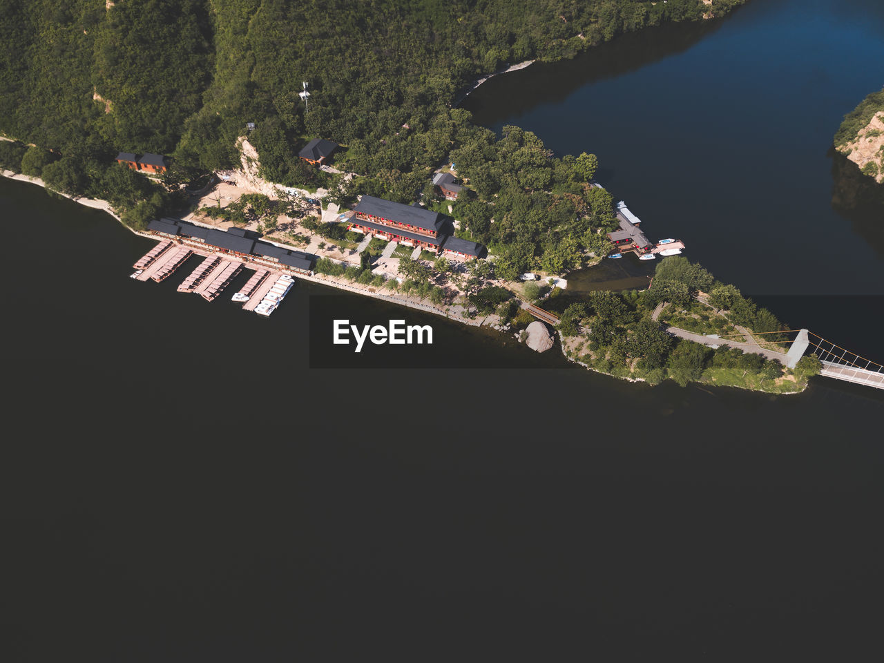 High angle view of trees and buildings against sky