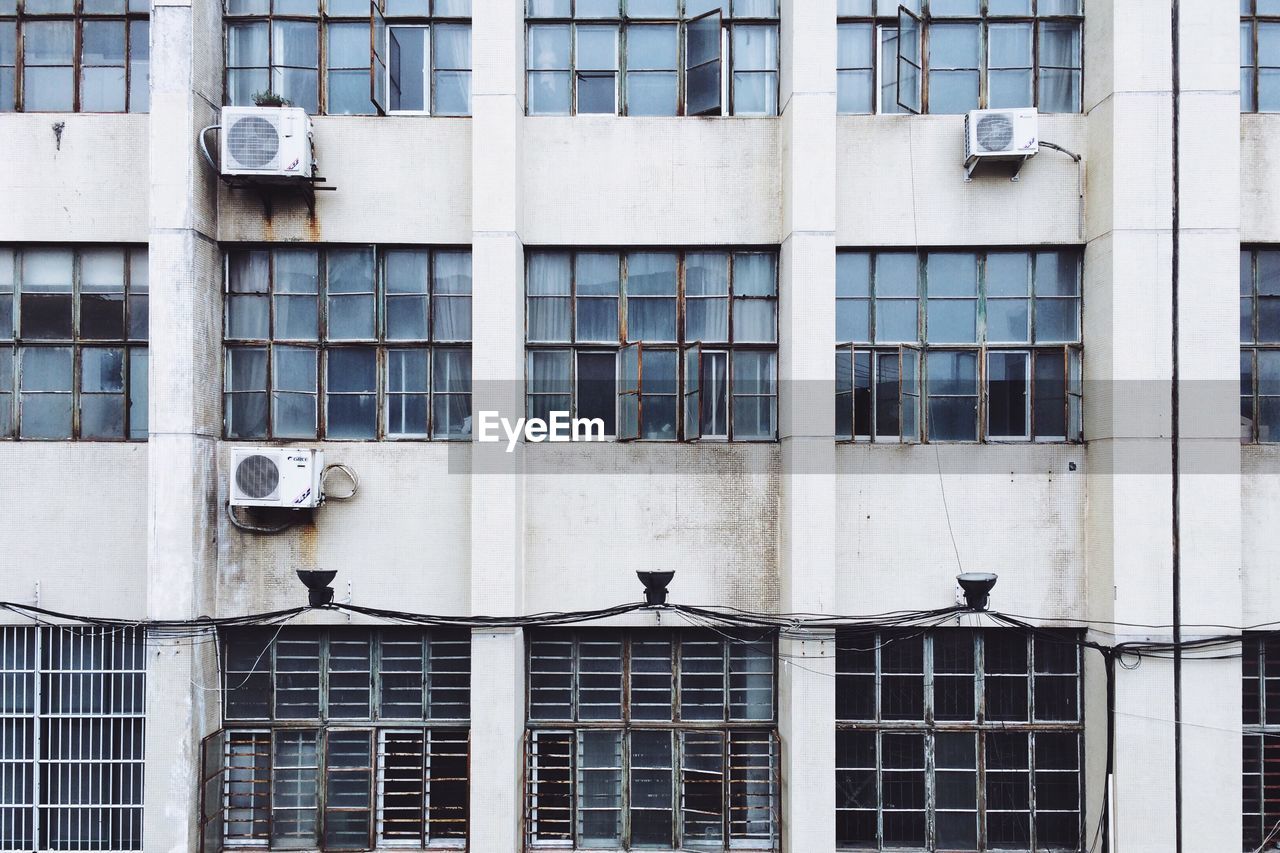 Old industrial building with rusty window frames