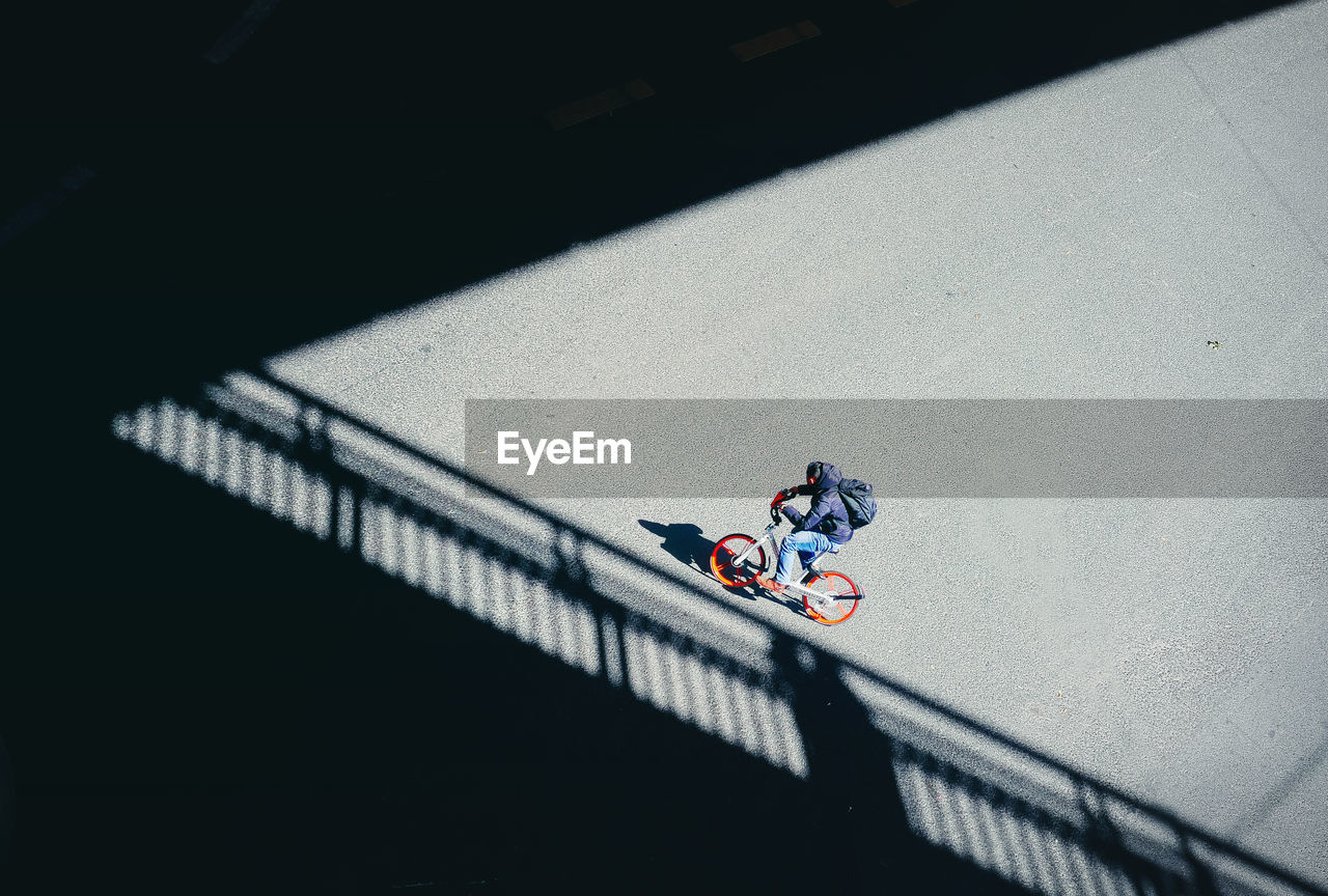 High angle view of man on bicycle