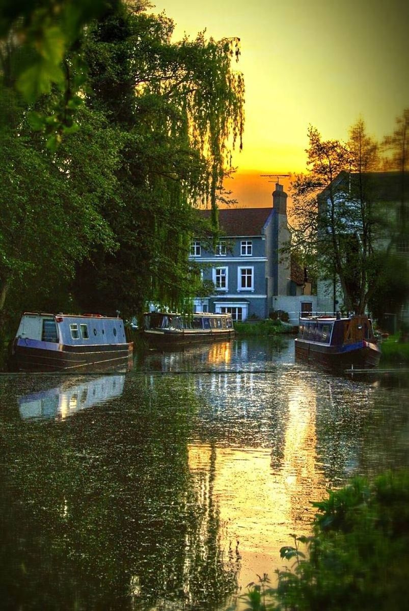 VIEW OF BUILDINGS AT SUNSET