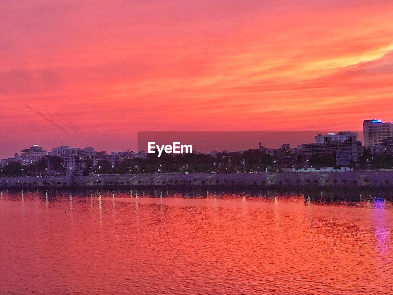 SCENIC VIEW OF LAKE AGAINST ROMANTIC SKY