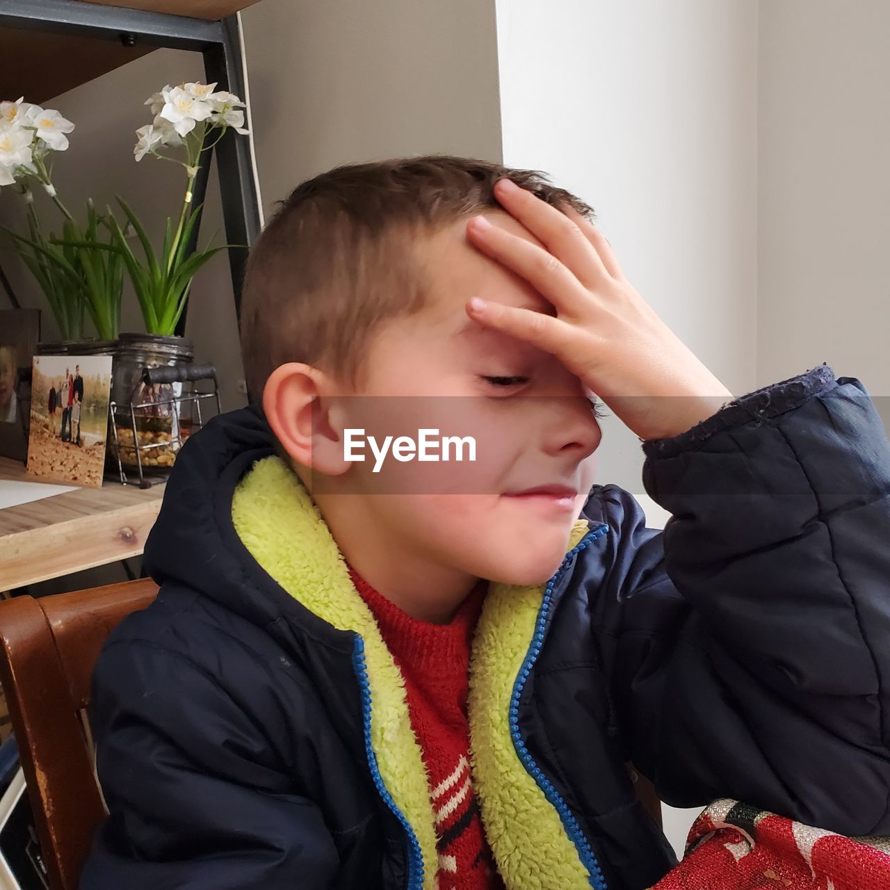 PORTRAIT OF BOY LOOKING AT CAMERA