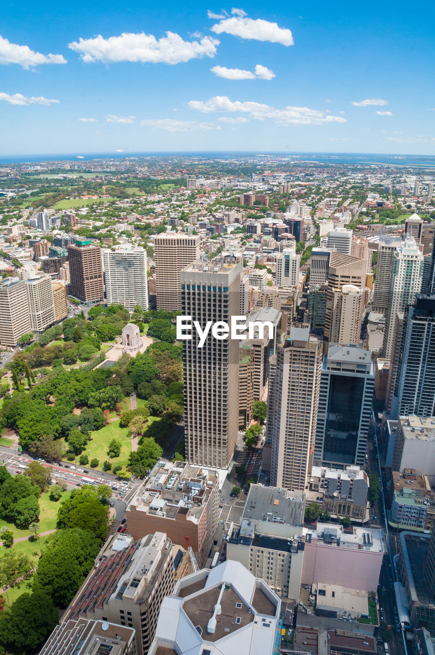 High angle view of buildings in city against sky