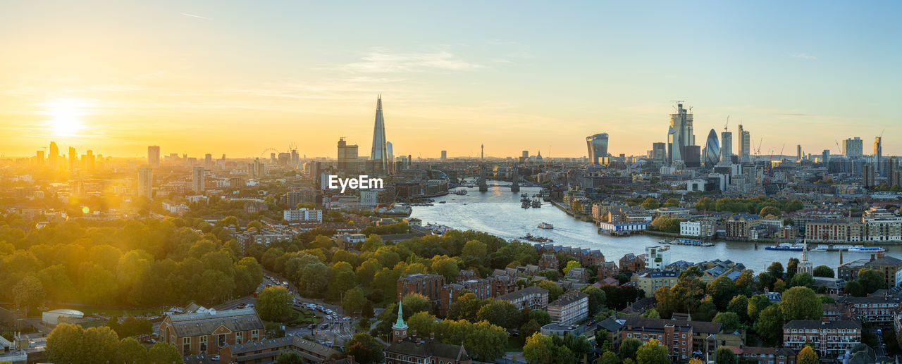 MODERN BUILDINGS IN CITY DURING SUNSET