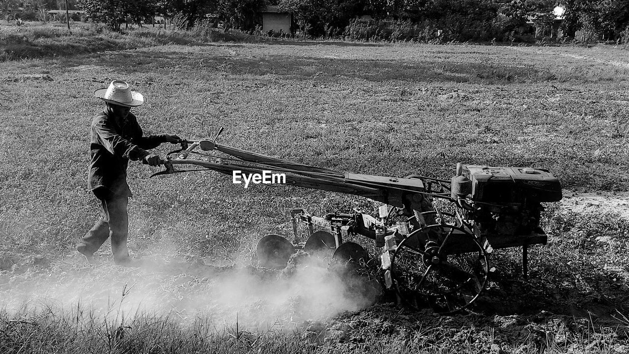 Side view of man on field