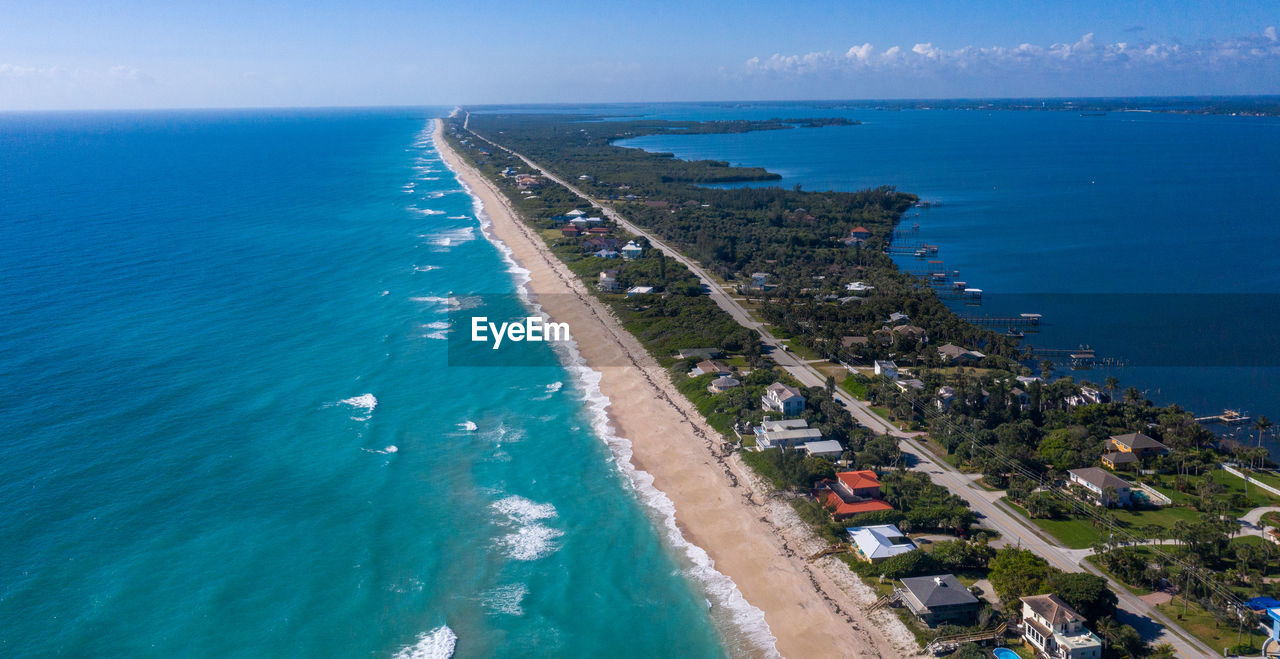 High angle view of sea against blue sky