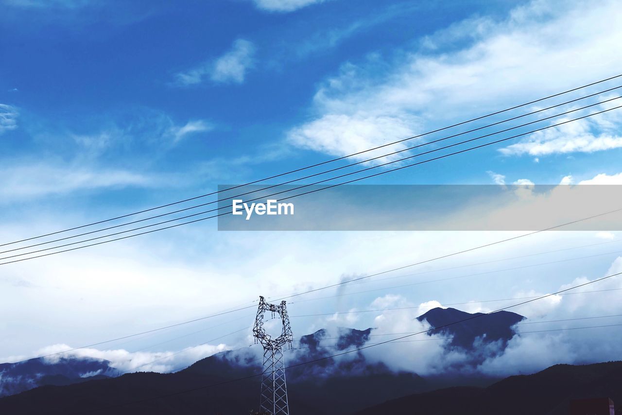 LOW ANGLE VIEW OF ELECTRICITY PYLON AGAINST SKY