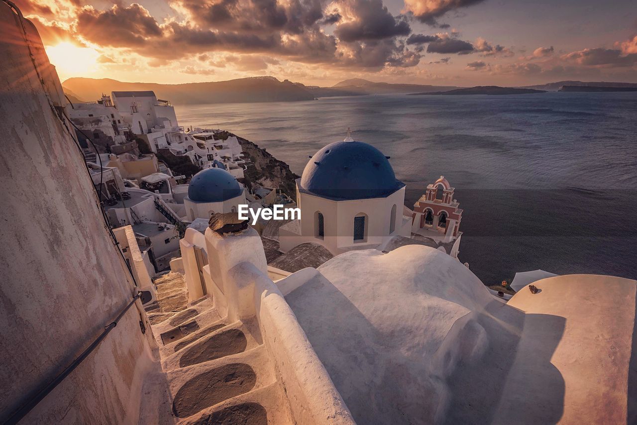 High angle view of buildings at santorini by sea