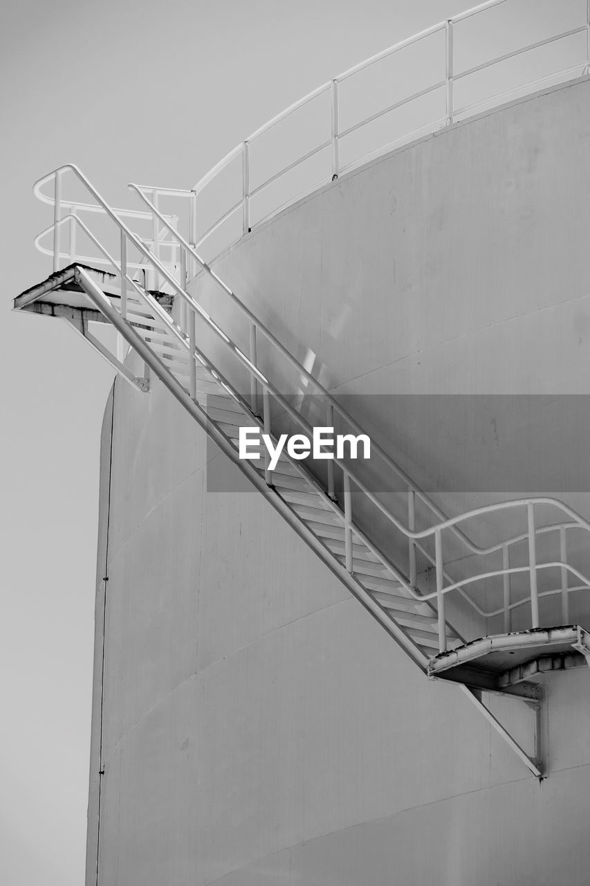 Low angle view of water tank against sky