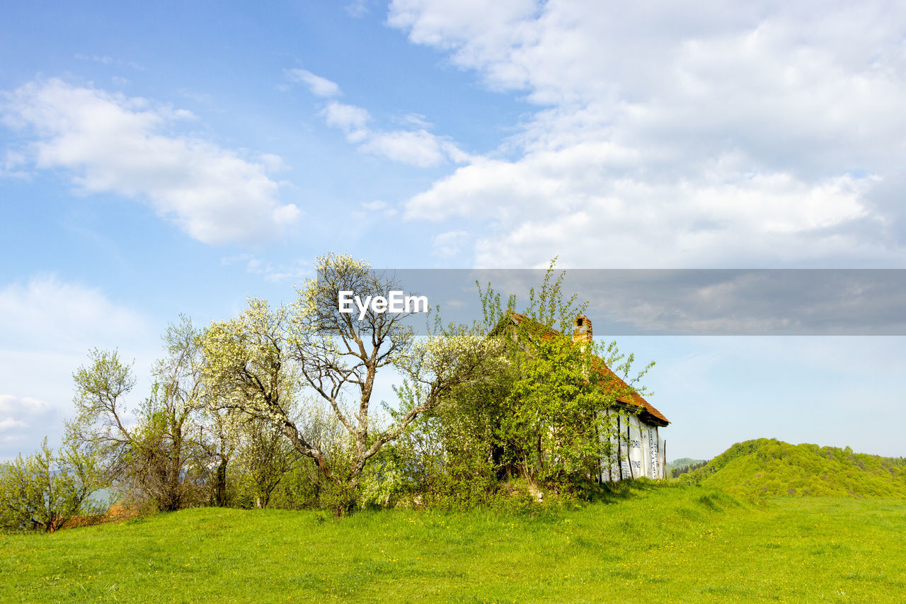 BUILT STRUCTURE ON LAND AGAINST SKY