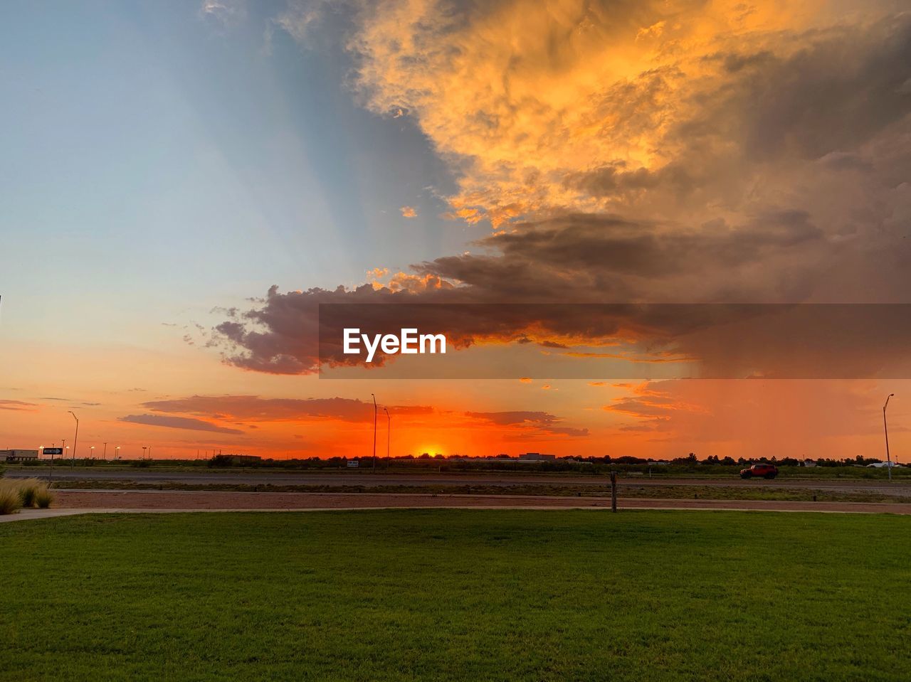 SCENIC VIEW OF SUNSET OVER LAND