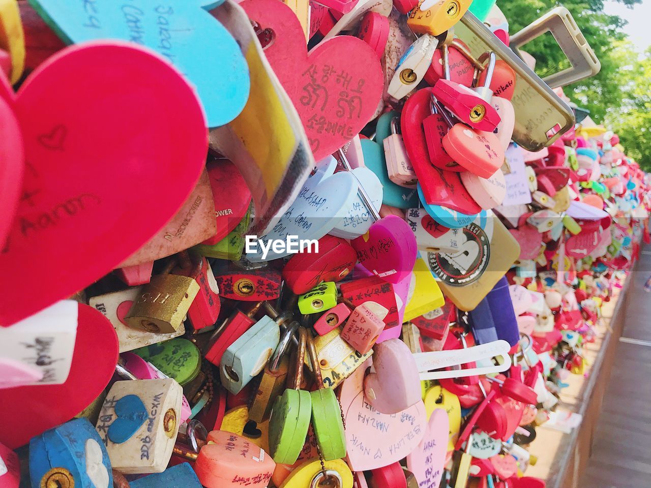 Close-up of love padlocks on railing