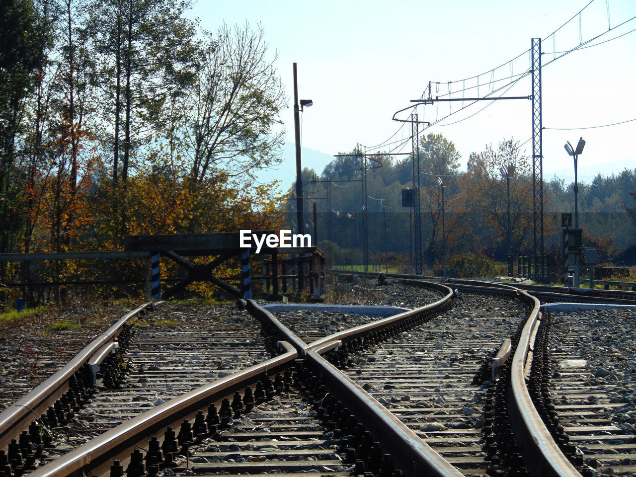 Railroad tracks against clear sky