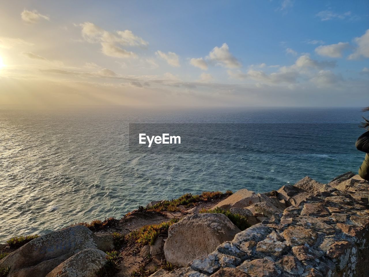 SCENIC VIEW OF SEA DURING SUNSET