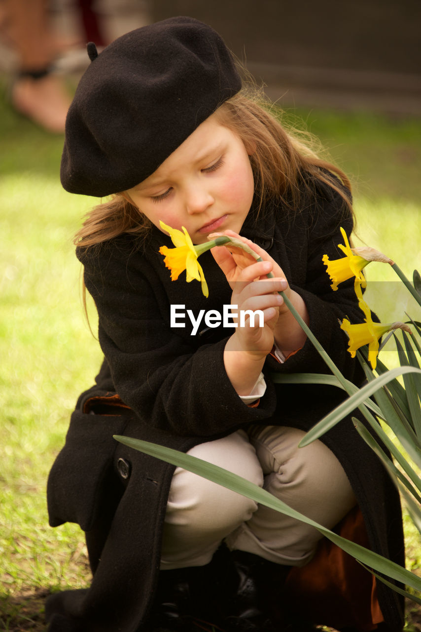 Cute girl holding flower