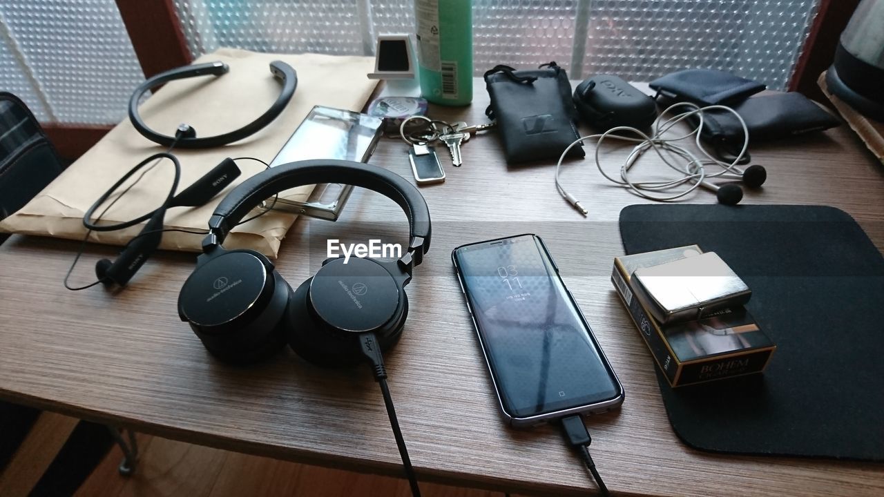 High angle view of technologies on table