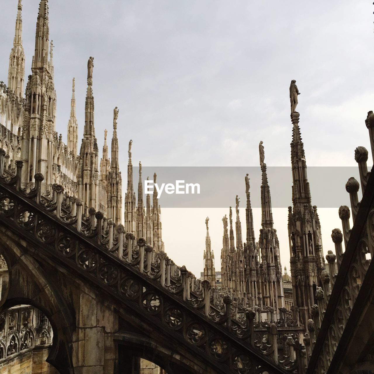 Low angle view of milan cathedral against clear sky