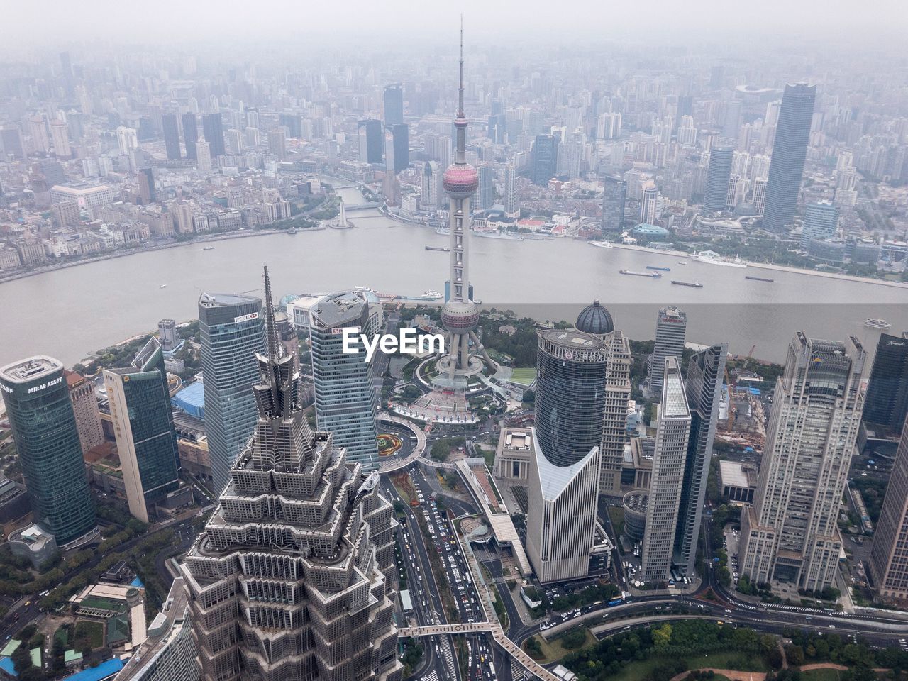 High angle view of city at riverbank