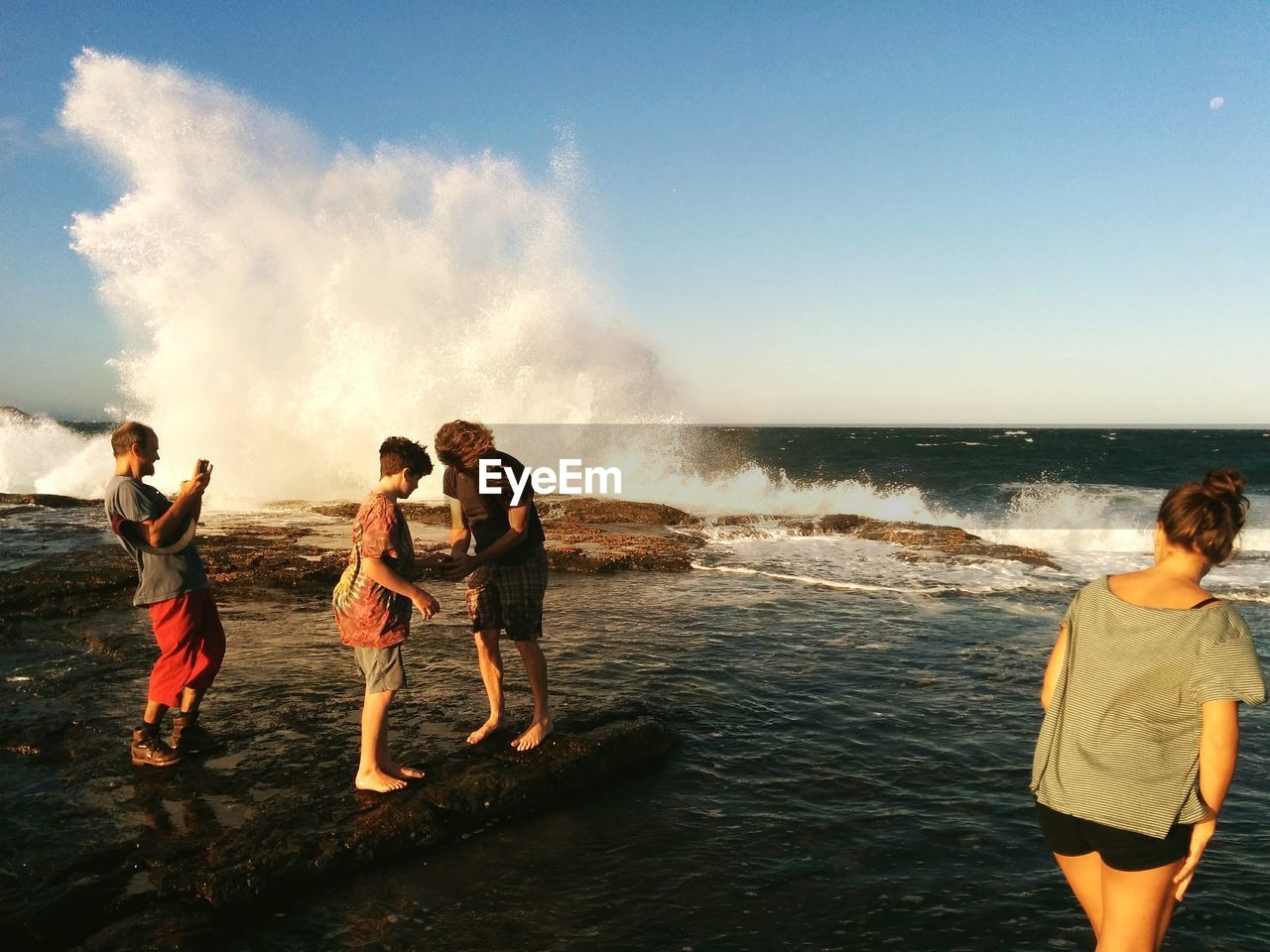 TWO PEOPLE IN WATER