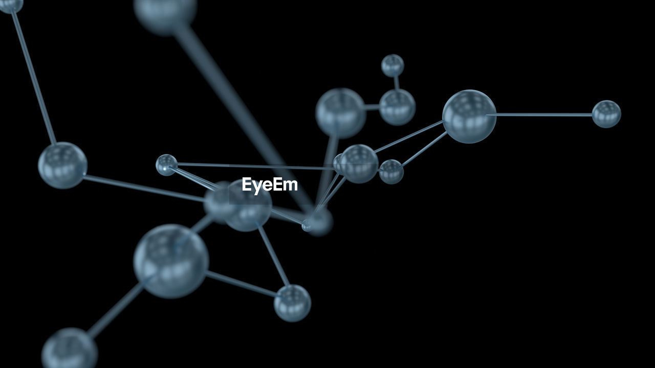 Close-up of molecular structure against black background