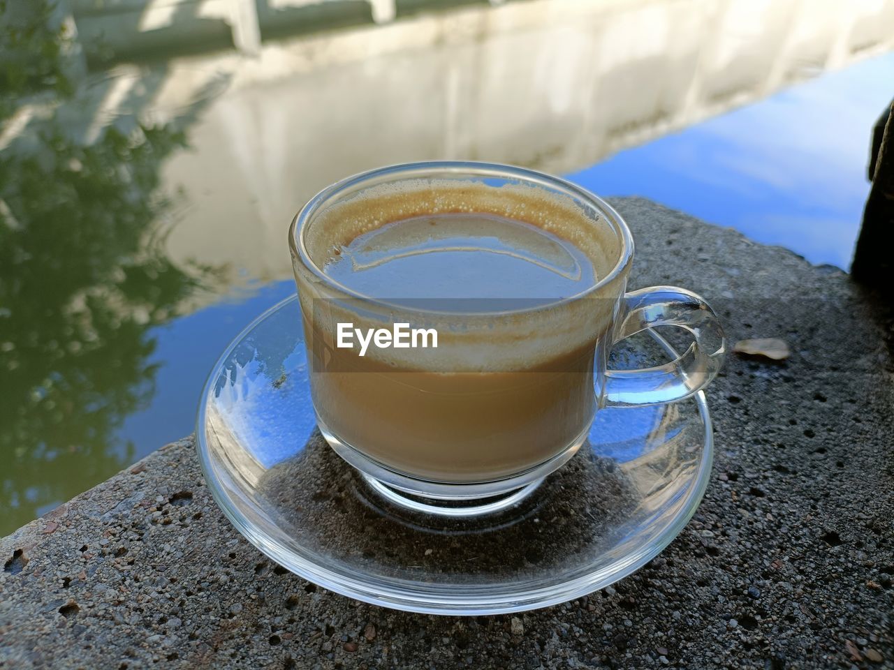 drink, food and drink, refreshment, cup, crockery, mug, coffee, food, freshness, saucer, hot drink, high angle view, household equipment, no people, day, table, drinking glass, water, glass, nature, still life, outdoors, coffee cup, close-up