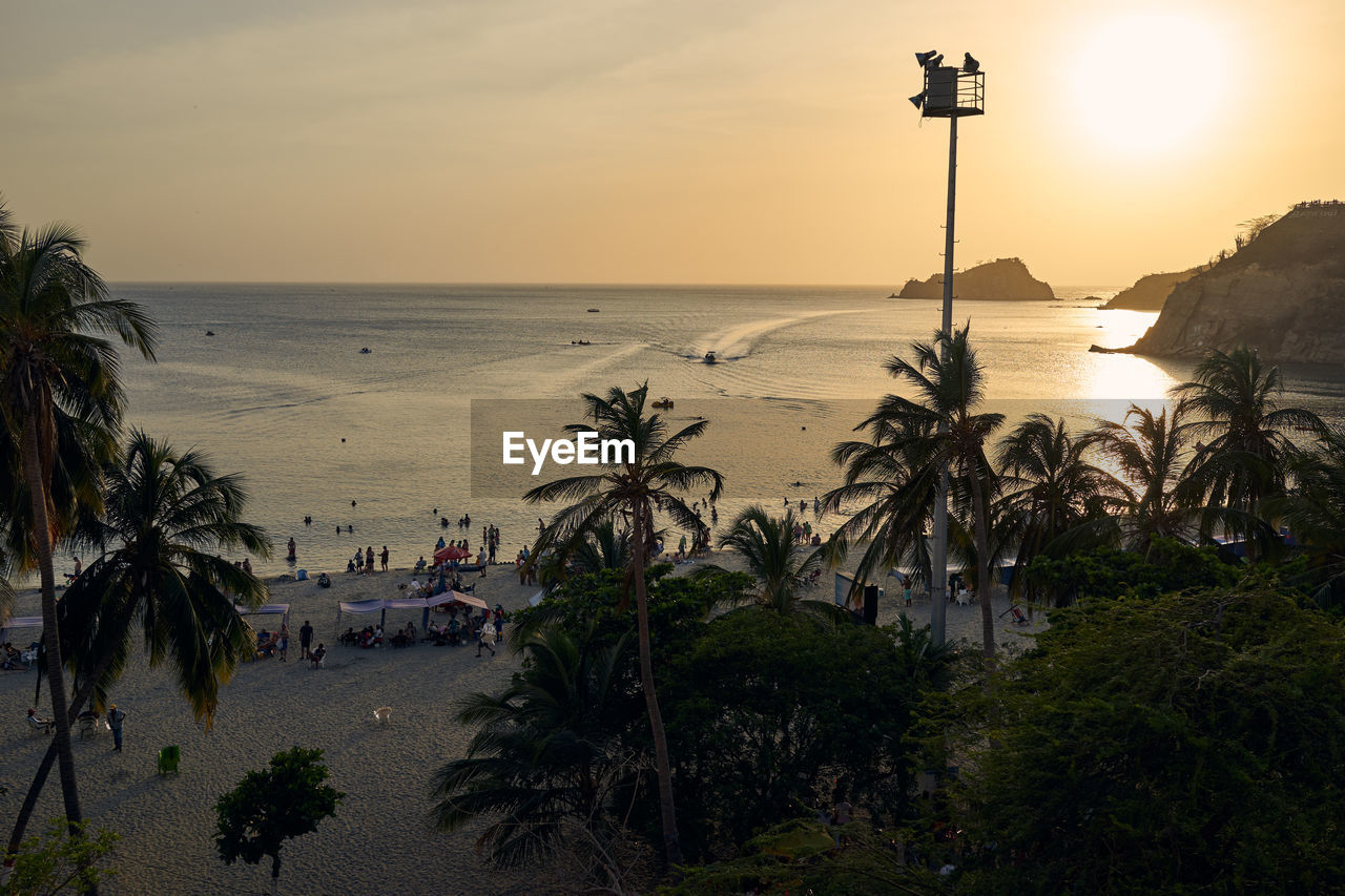 Scenic view of beach at sunset