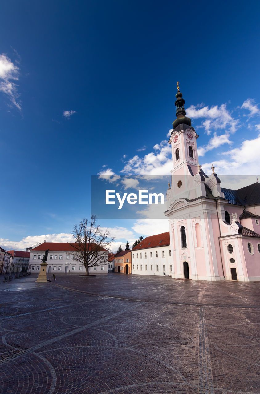 Square saint teresa of avila and church in pozega.