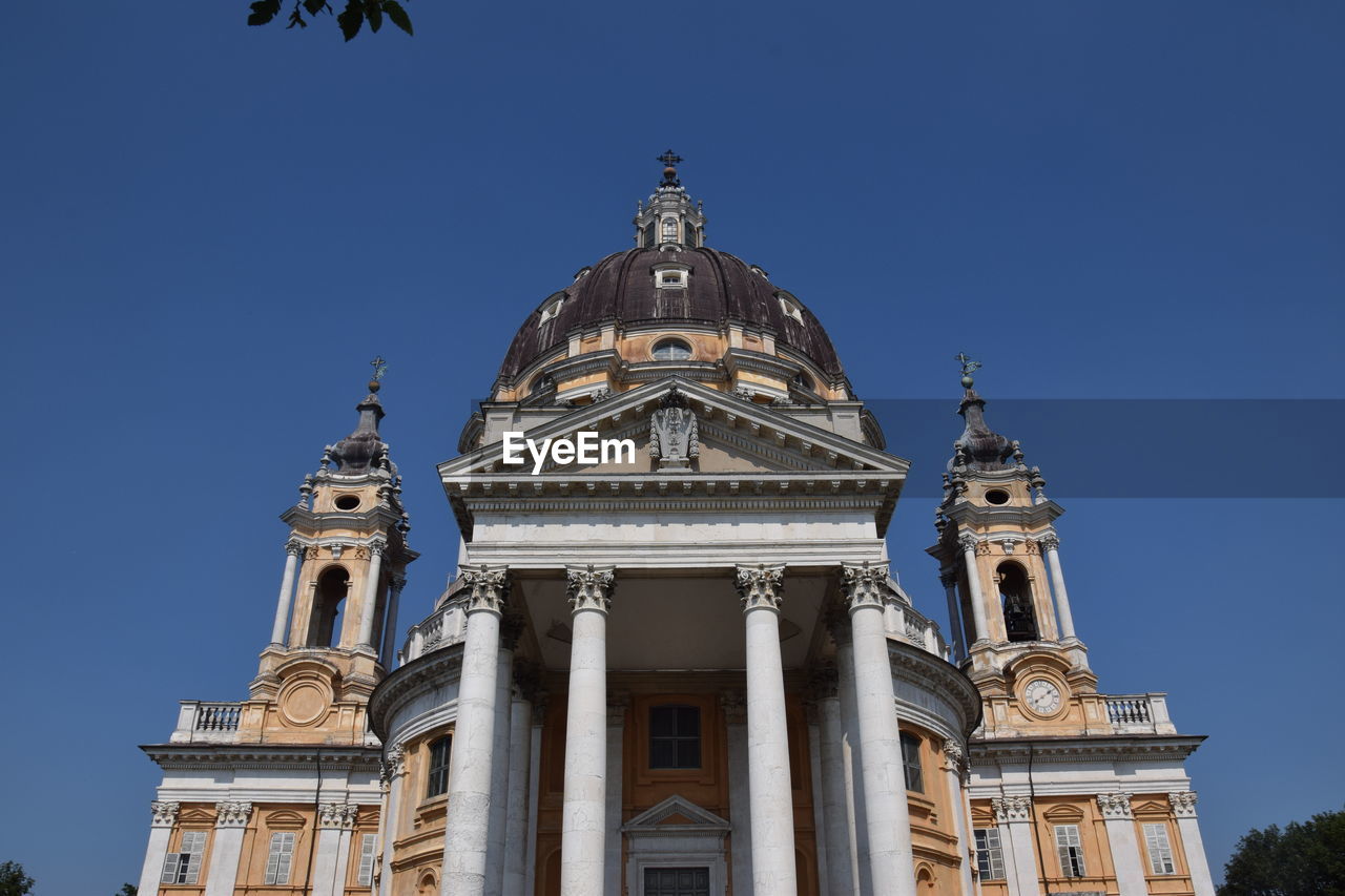 Low angle view of basilica of superga against clear blue sky